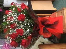 Two dozen roses boxed  Red Any 95.00 GBP plus delivery